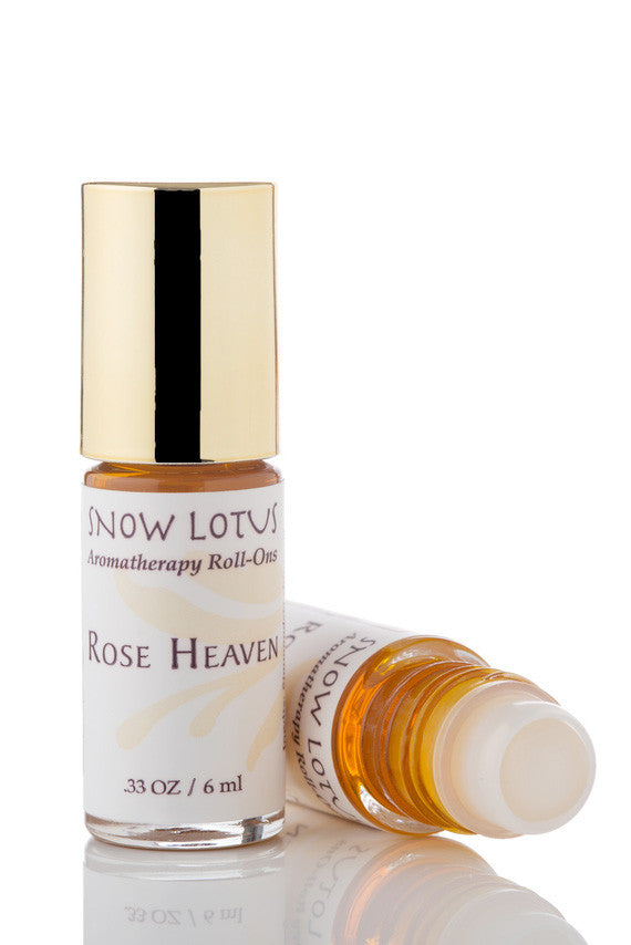Snow Lotus Rose Heaven - Esthetic Roll On in a roll-on bottle with a metallic cap