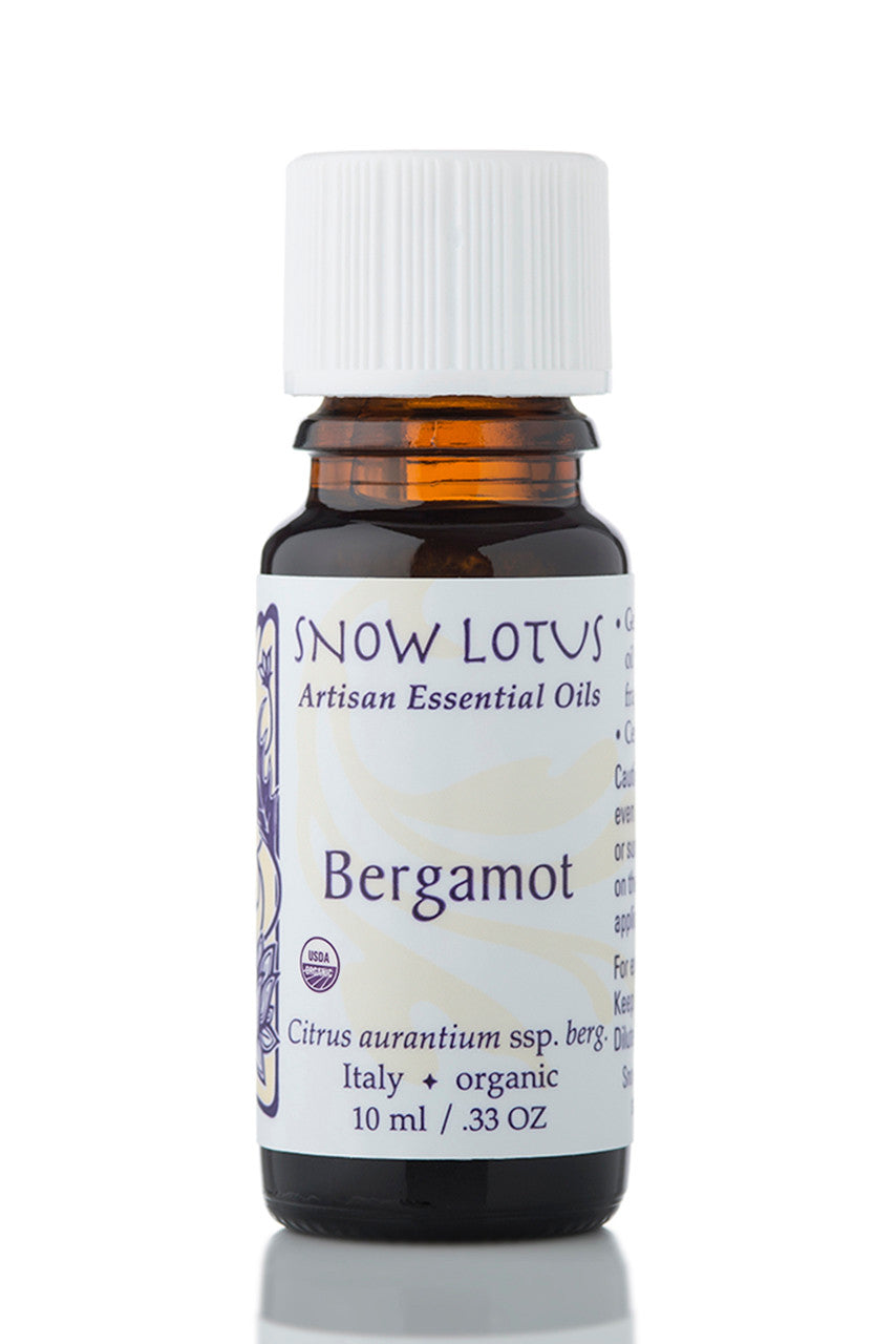 Snow Lotus organic Bergamot Essential Oil in an amber glass bottle