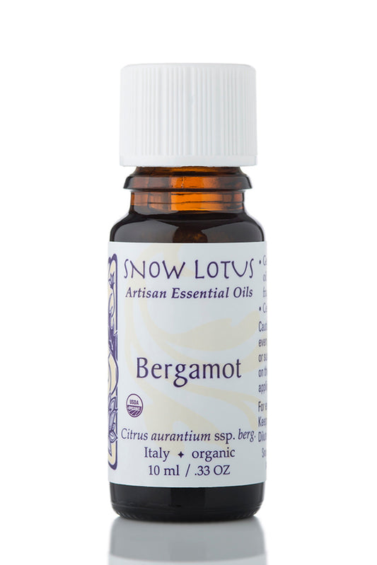 Snow Lotus organic Bergamot Essential Oil in an amber glass bottle