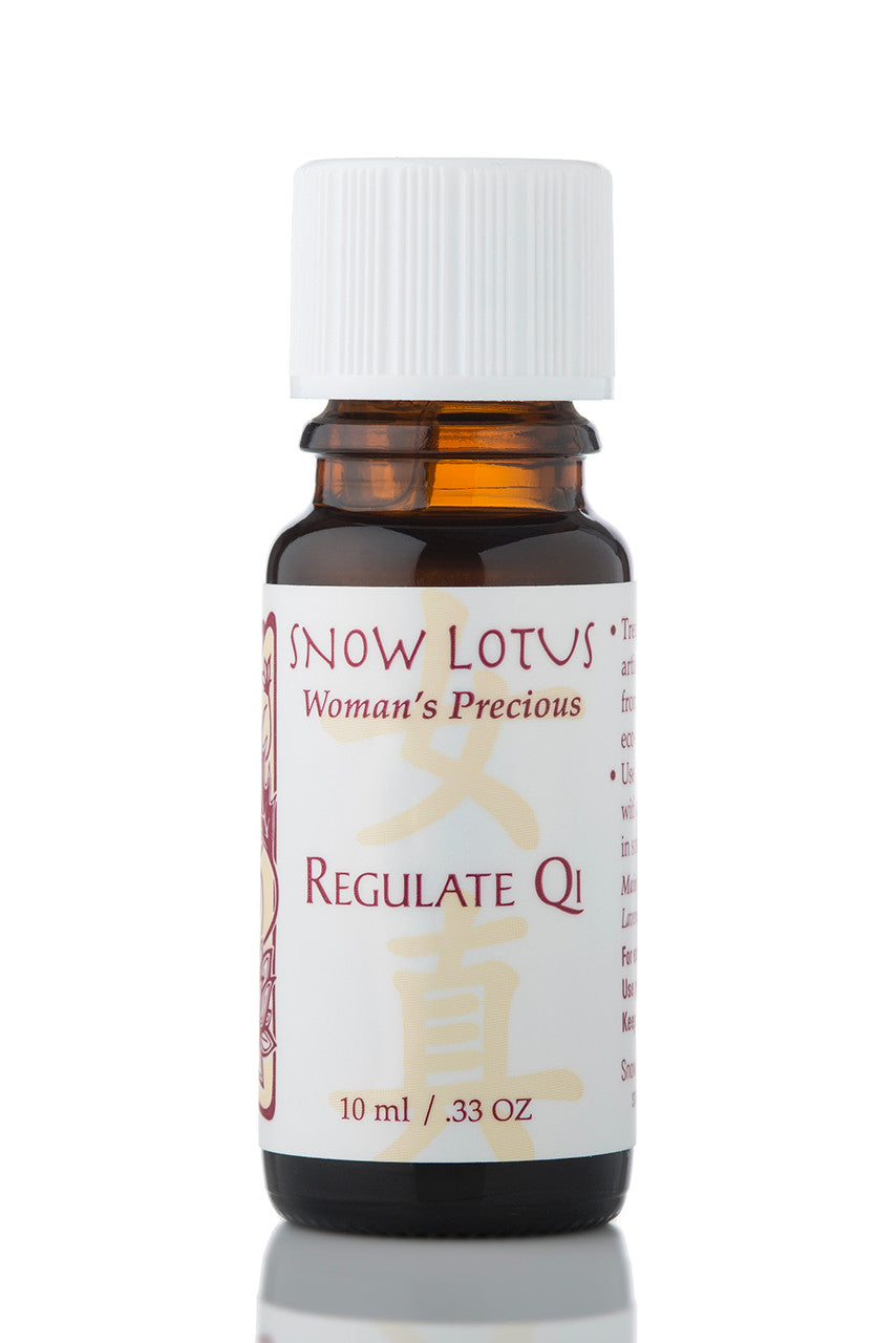 Snow Lotus Regulate Qi - Woman's Precious Blend in an amber glass bottle