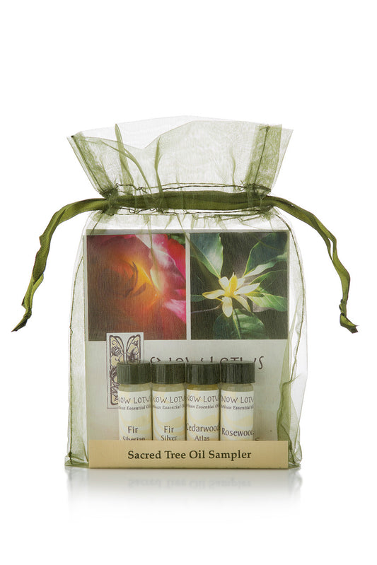 Sacred Tree Essential Oil Sampler in a green organza pouch