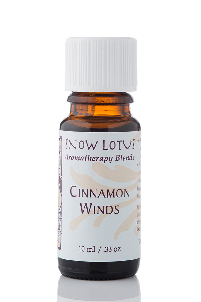 Snow Lotus Cinnamon Winds - Esthetic Essential Oil Blend in an amber glass bottle
