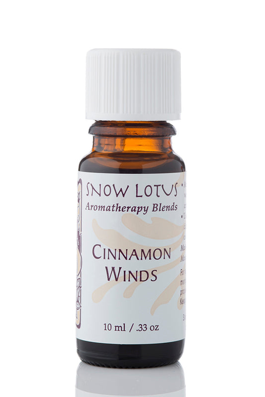 Snow Lotus Cinnamon Winds - Esthetic Essential Oil Blend in an amber glass bottle