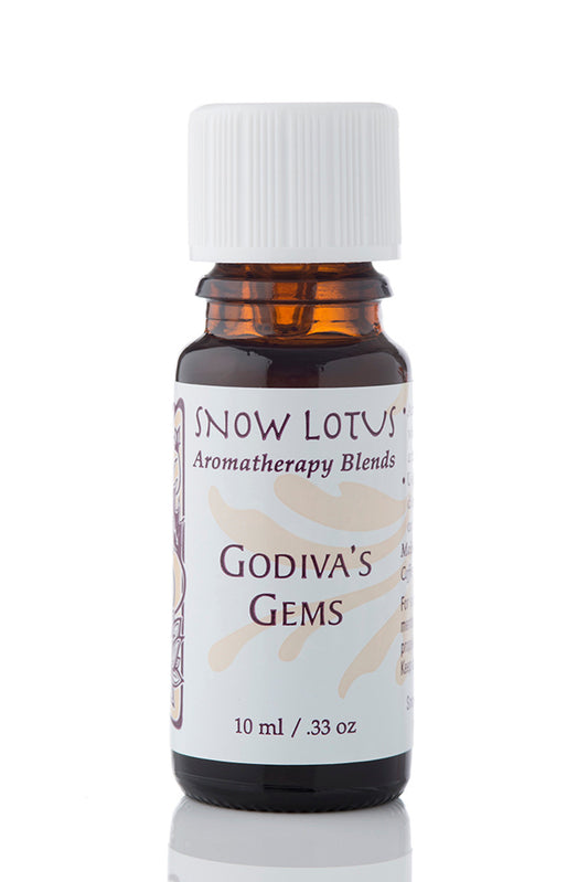 Snow Lotus Godiva's Gems - Esthetic Essential Oil Blend in an amber glass bottle