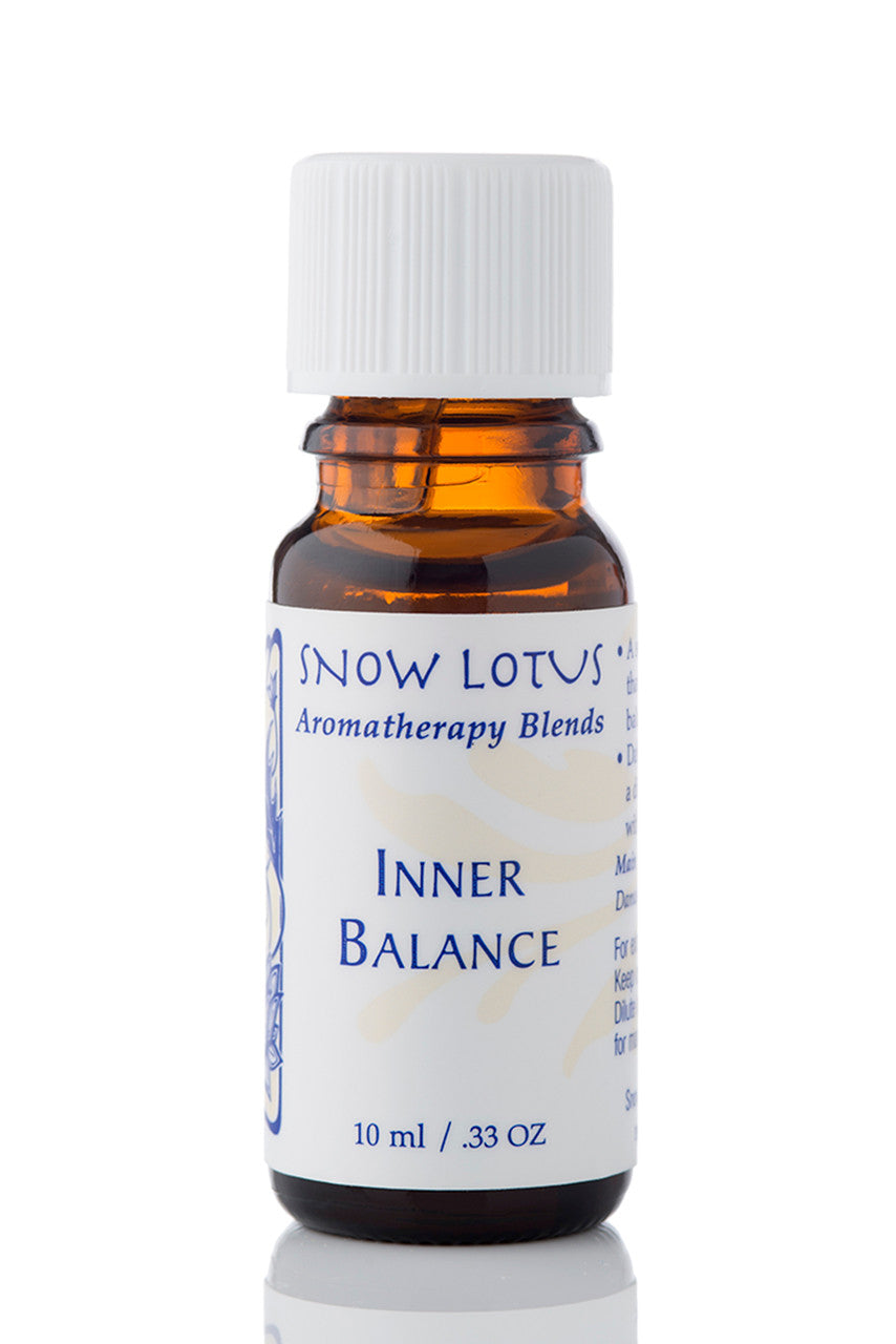 Snow Lotus Inner Balance - Esthetic Essential Oil Blend in an amber glass bottle