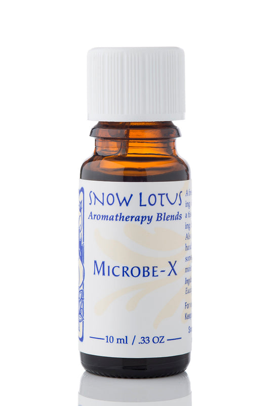 Snow Lotus Microbe-X - Therapeutic Essential Oil Blend in an amber glass bottle