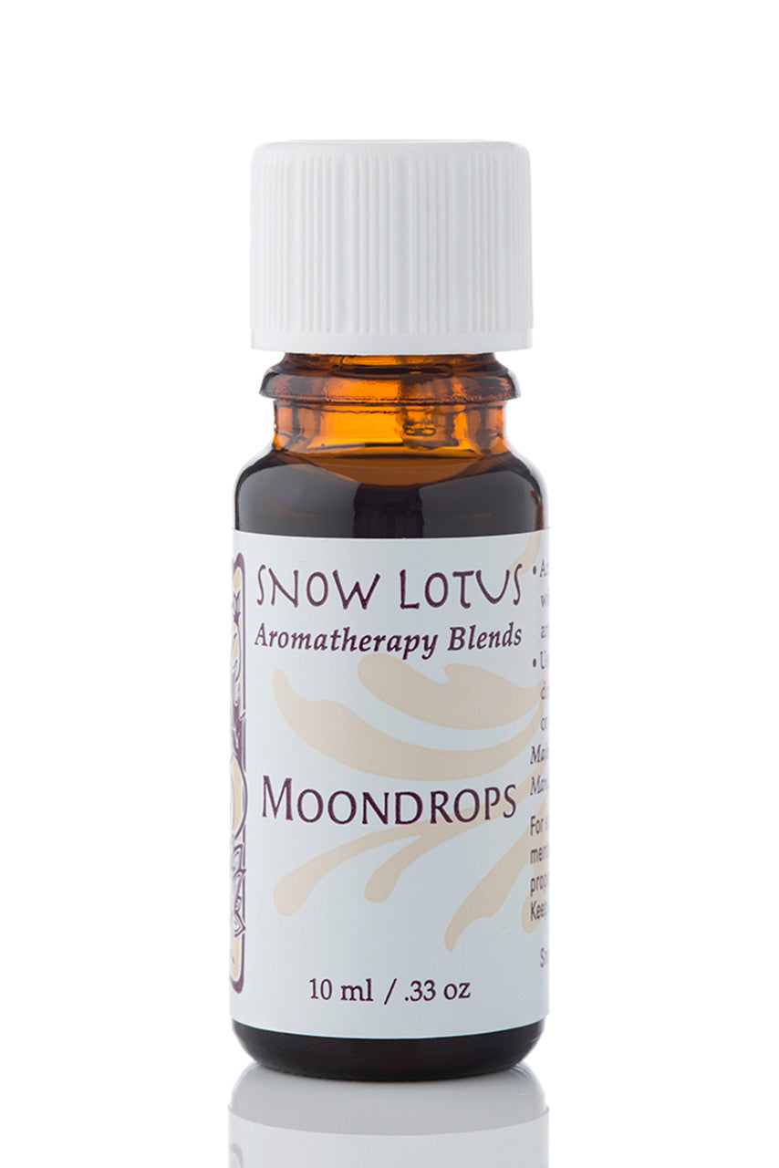 Snow Lotus Moondrops - Esthetic Essential Oil Blend in an amber glass bottle