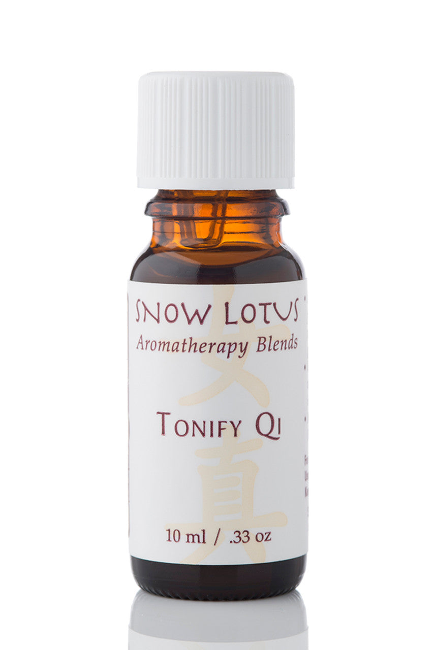 Snow Lotus Tonify Qi – CM Essentials Blend in an amber glass bottle