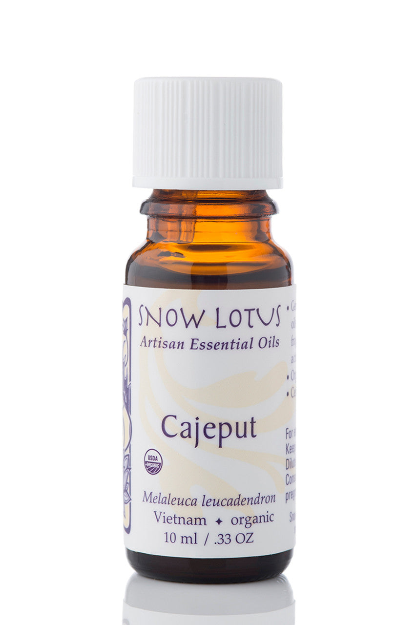 Snow Lotus organic Cajeput Essential Oil in an amber glass bottle