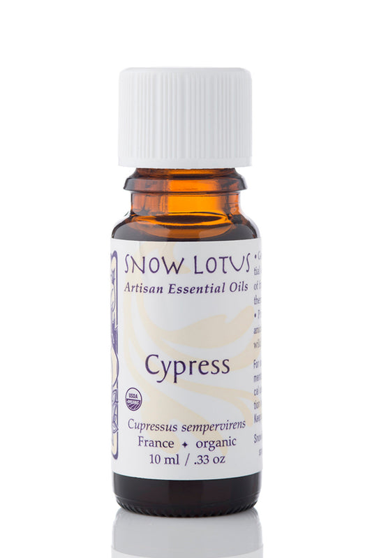 Snow Lotus organic Cypress Essential Oil in an amber glass bottle