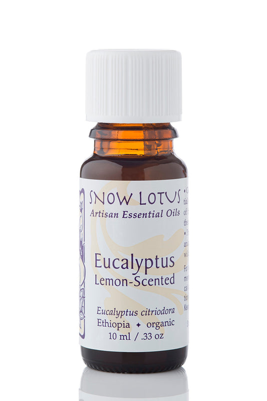 Snow Lotus Lemon Eucalyptus Essential Oil in an amber glass bottle