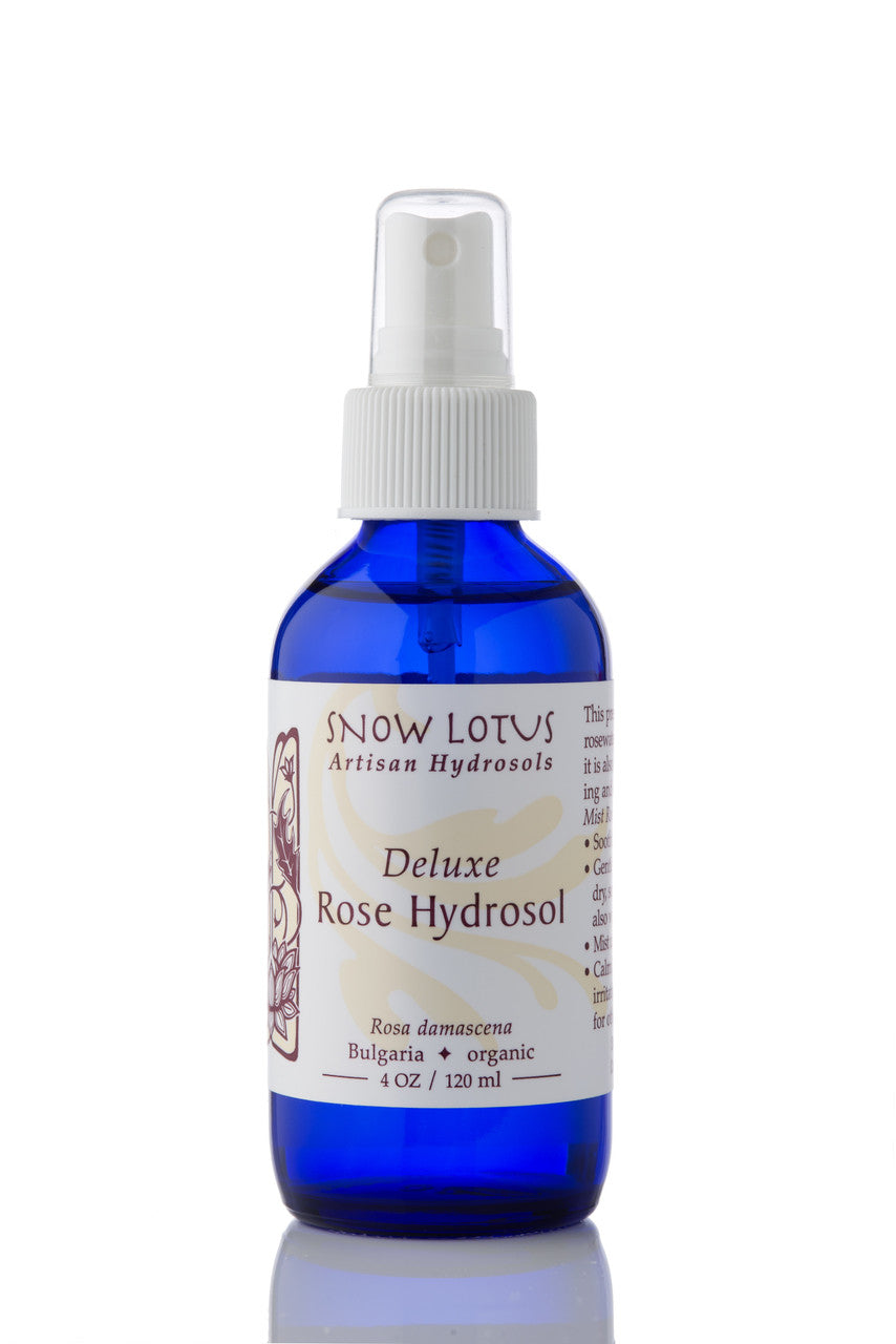 Snow Lotus organic Rose Deluxe Hydrosol (Rosewater) in a blue spray bottle