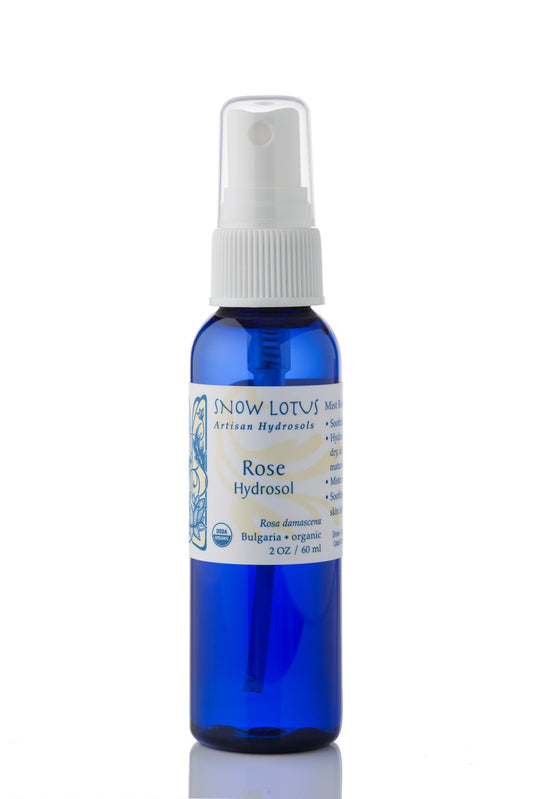Snow Lotus organic Rose Hydrosol (Rosewater) in a blue spray bottle