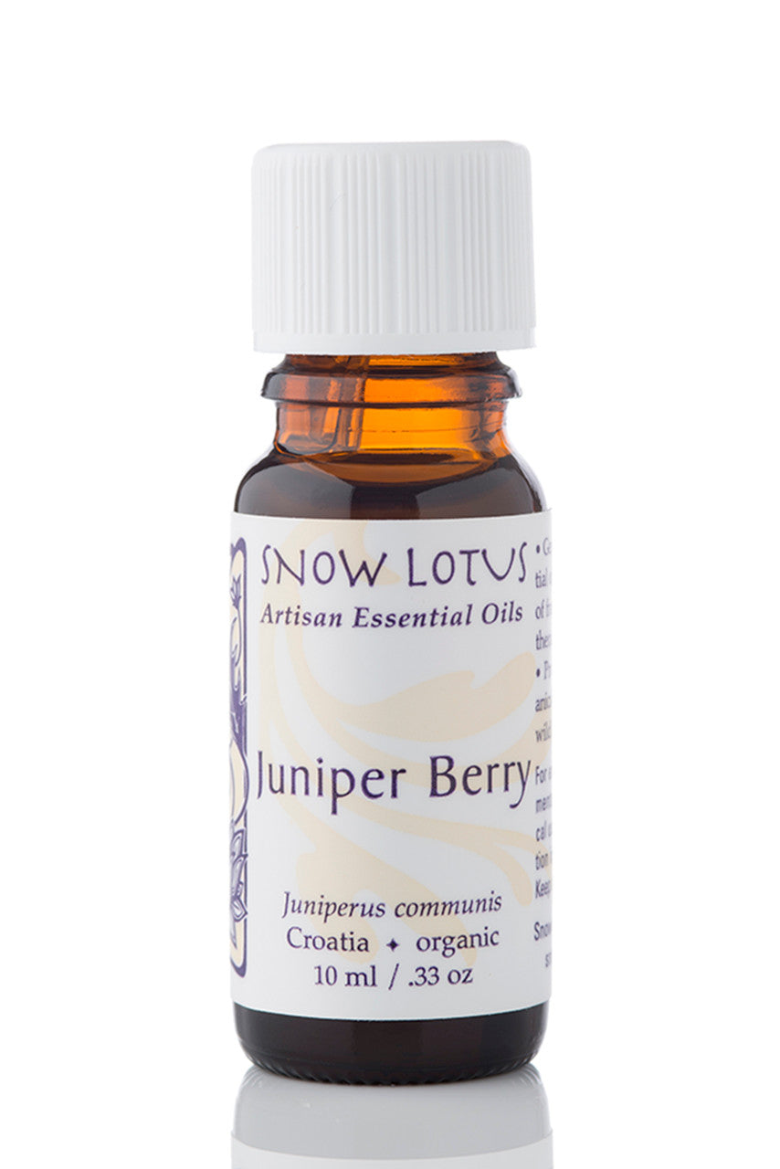 Snow Lotus Juniper Berry Essential Oil in an amber glass bottle