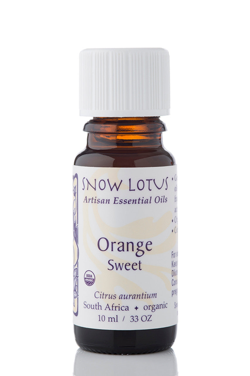 Snow Lotus organic Sweet Orange Essential Oil in an amber glass bottle