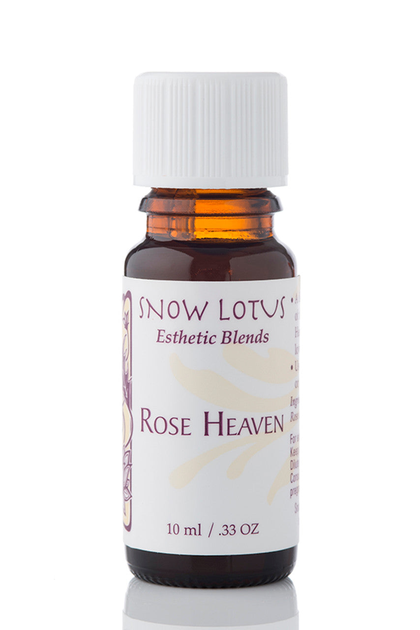 Snow Lotus Rose Heaven - Esthetic Essential Oil Blend in an amber glass bottle