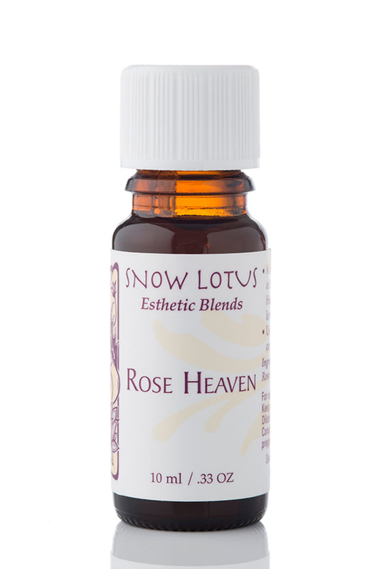 Snow Lotus Rose Heaven - Esthetic Essential Oil Blend in an amber glass bottle