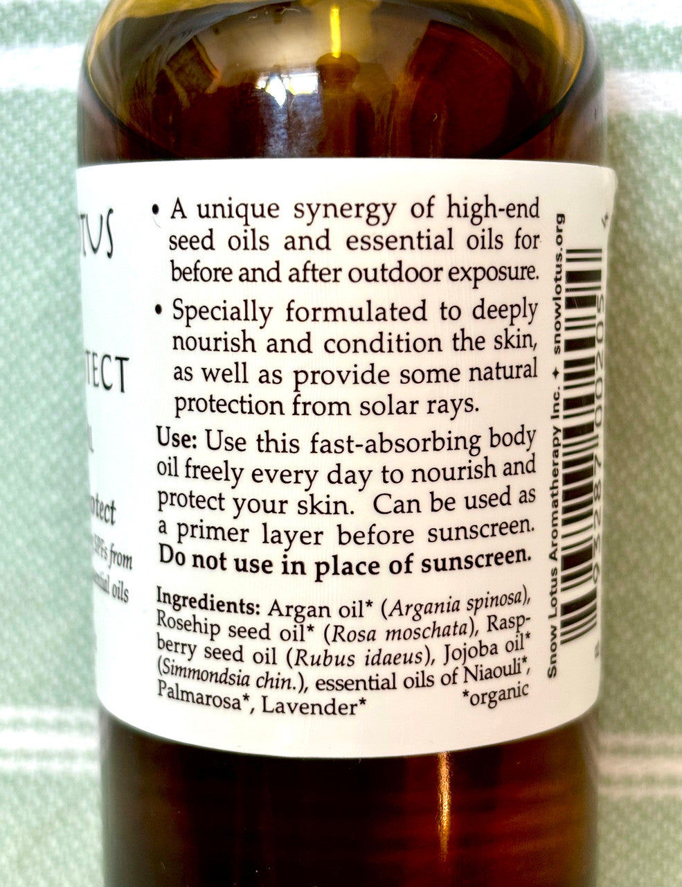 Usage and ingredient label on the Snow Lotus Skin Protect Body Oil