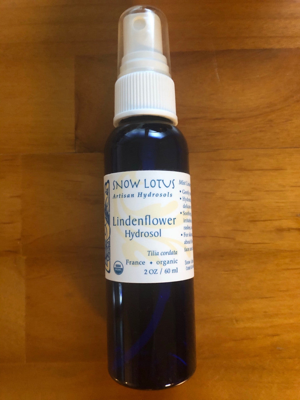 Snow Lotus Lindenflower Hydrosol (Linden Water), Organic in a blue spray bottle