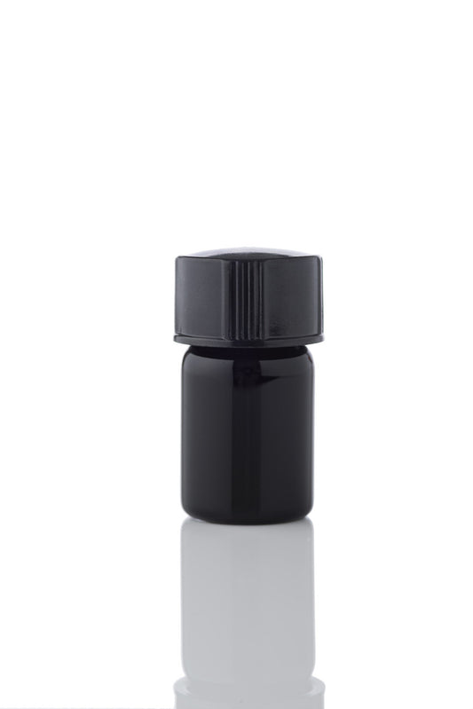 Small black glass vial used for precious oils