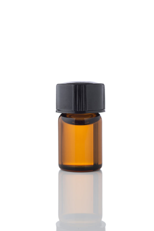 Small amber glass vial with a black cap, used for precious oils