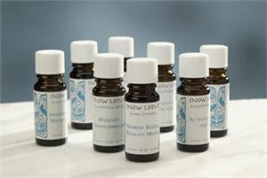 A group of Snow Lotus Woman's Precious Blend bottles arranged together