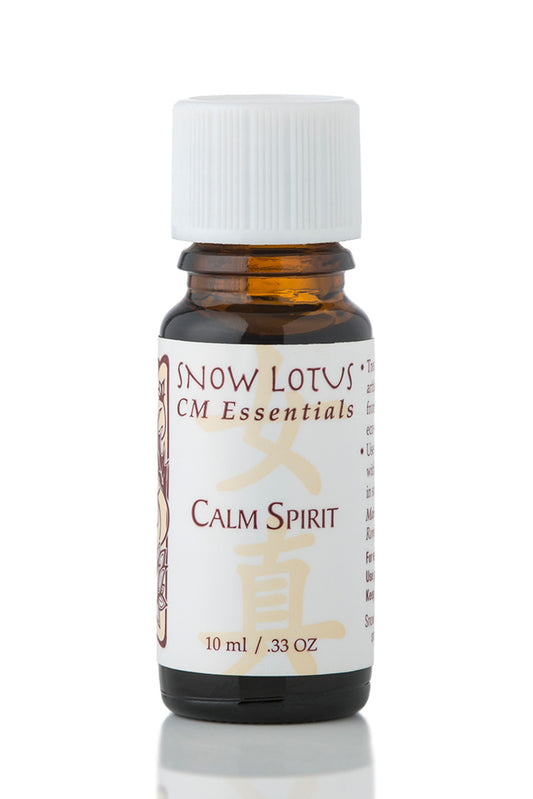 Snow Lotus Calm Spirit – Woman's Precious Blend in an amber glass bottle