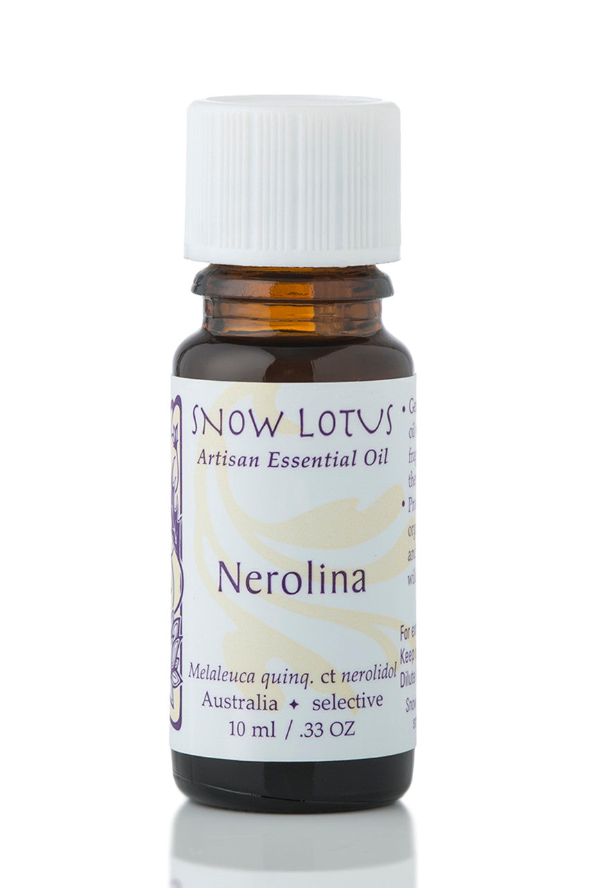Snow Lotus Nerolina Essential Oil in an amber glass bottle