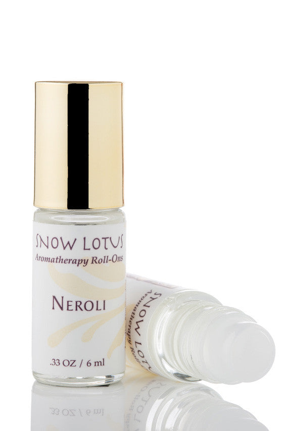 Snow Lotus Neroli 10% in Jojoba - Esthetic Roll On in a roll-on bottle with a metallic cap